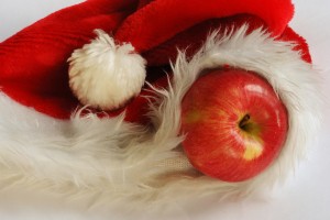 bigstock-Apple-In-Santa-Claus-Cap-3884736